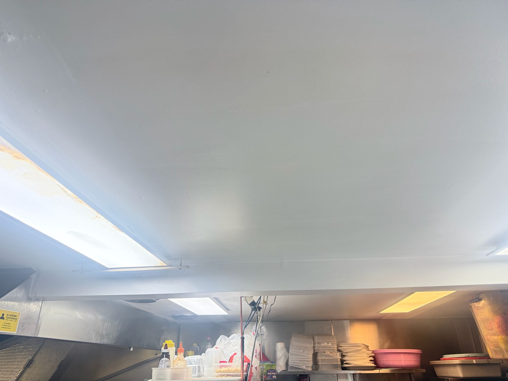 Kitchen ceiling after painting — freshly painted clean finish